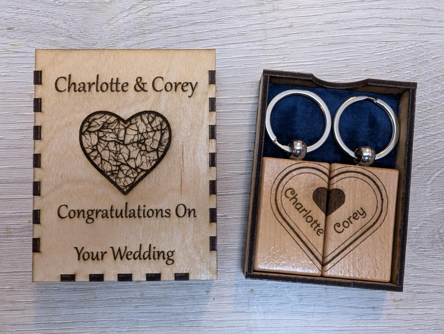 Matching wedding date keepsake keyrings in a handmade box, unique couples keychains.